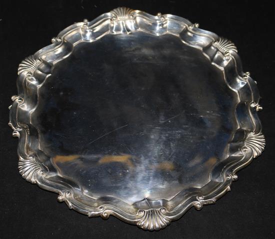 A silver salver with anthemion and scroll cast rim, Thomas Bradbury & Sons Ltd, Sheffield, 1908, 24 oz.